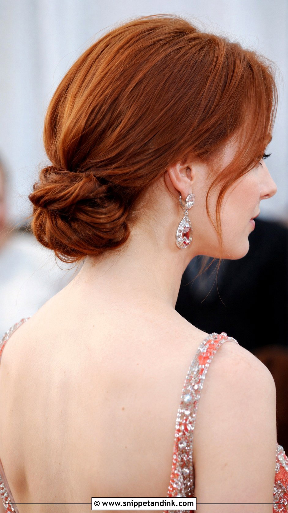 Low Twisted Chignon - Snippet and Ink - 25 Wedding Hairstyles for Guests