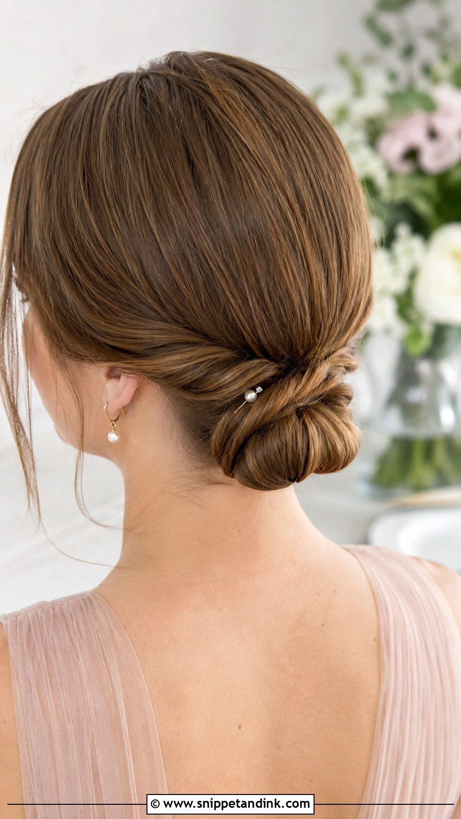 Low Twisted Chignon - Snippet and Ink - 25 Wedding Party Hairstyles