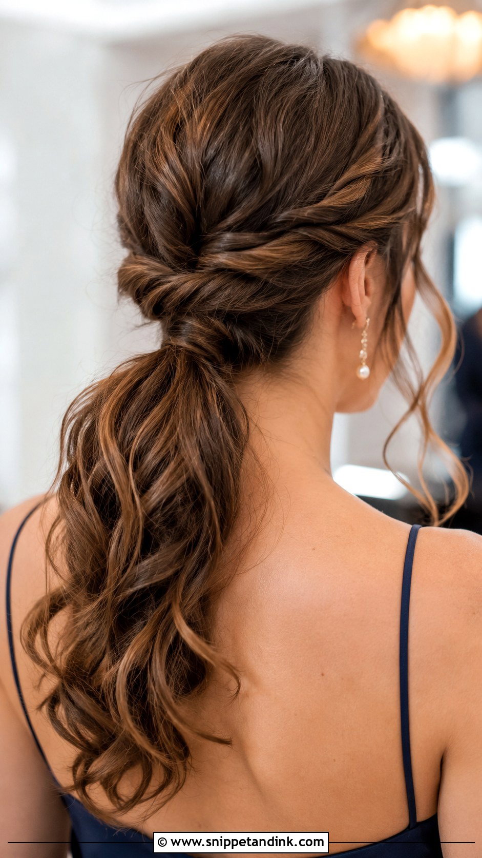Low Twisted Ponytail - Snippet and Ink - 30 Medium Wedding Guest Hairstyles