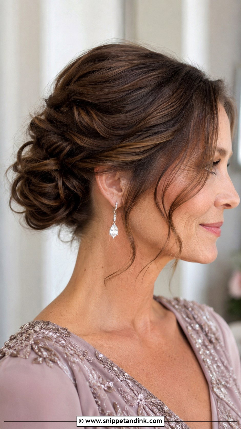 Low Twisted Updo - Snippet and Ink - 20 Wedding Party Hairstyles for Medium Hair