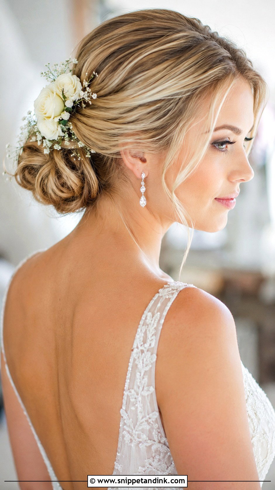 Low Wedding Bun With Flowers - Snippet and Ink - 15 Wedding Hair Updo with Flowers Ideas