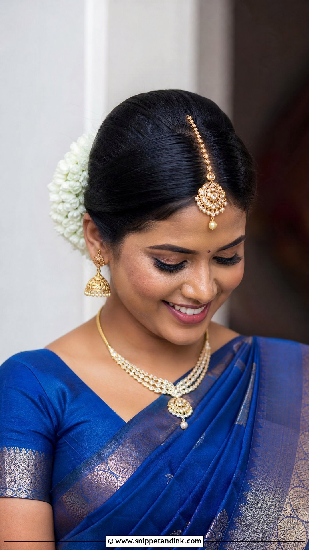 Maang Tikka Bun Hairstyle - Snippet and Ink - 20 Tamil Bridal Hairstyles
