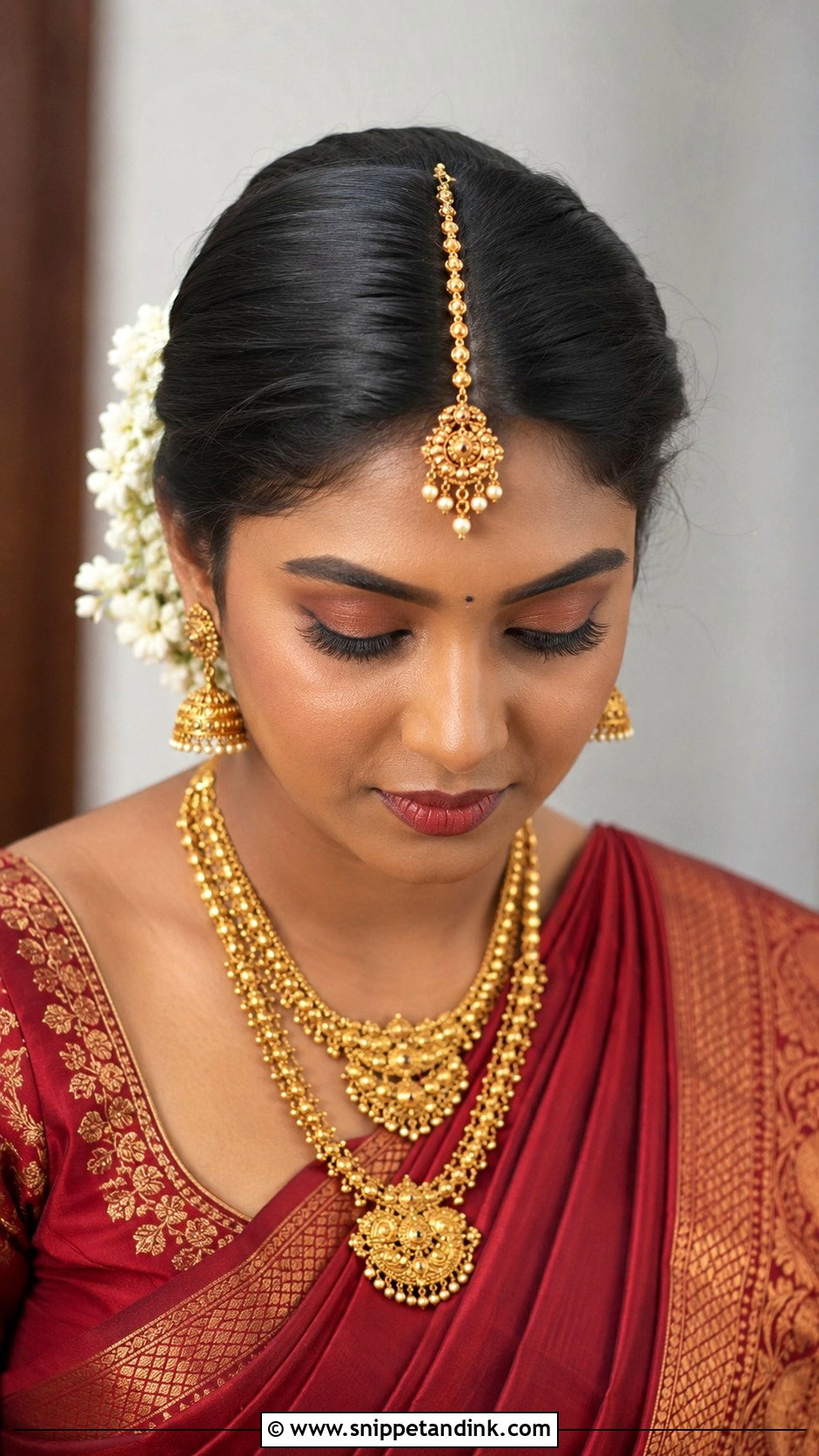 Maang Tikka Bun Look - Snippet and Ink - 25 South Indian Bride Engagement Hairstyle Ideas