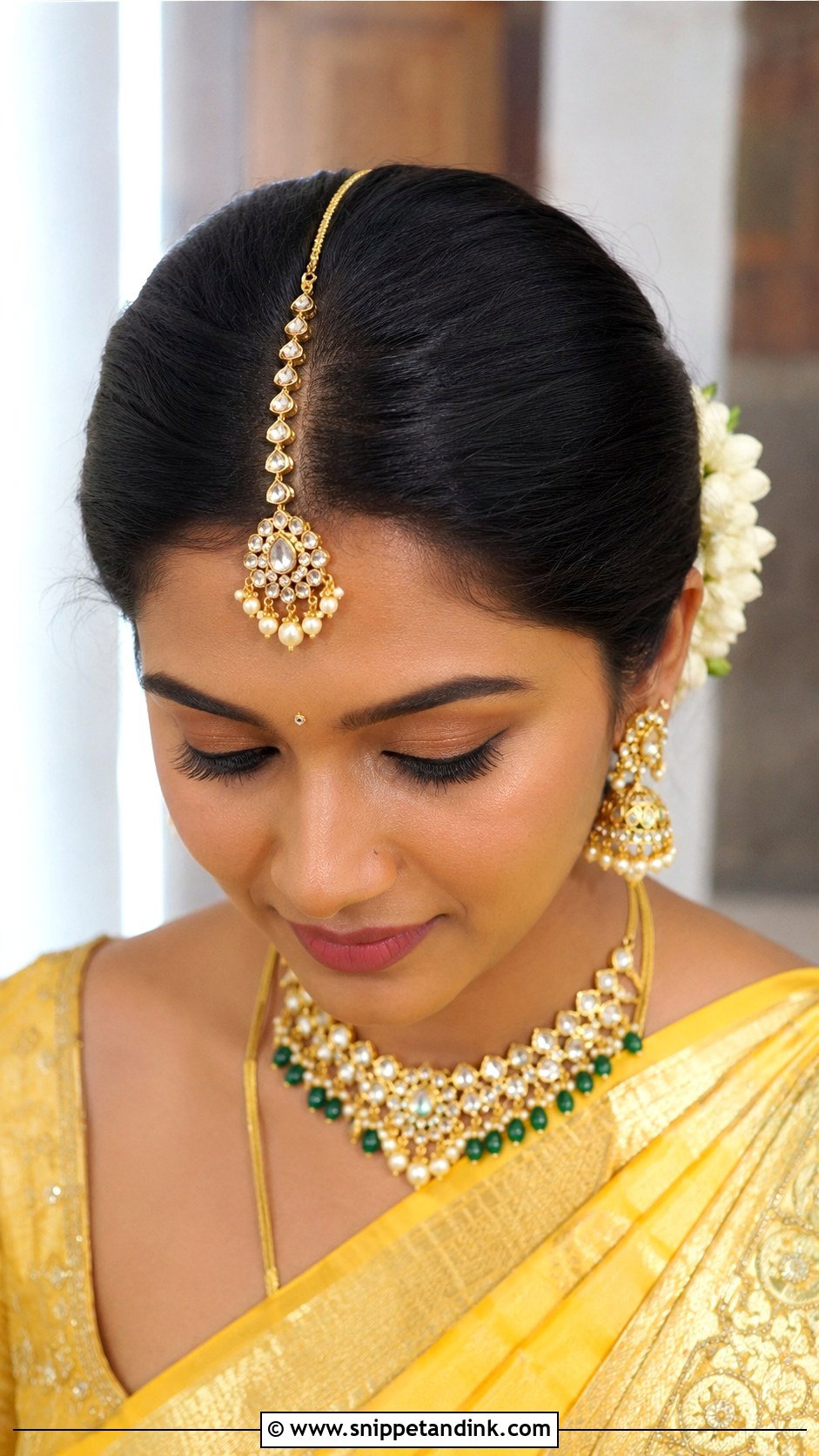 Maang Tikka Centered Bun Look - Snippet and Ink - 25 Telugu Bride Hairstyles