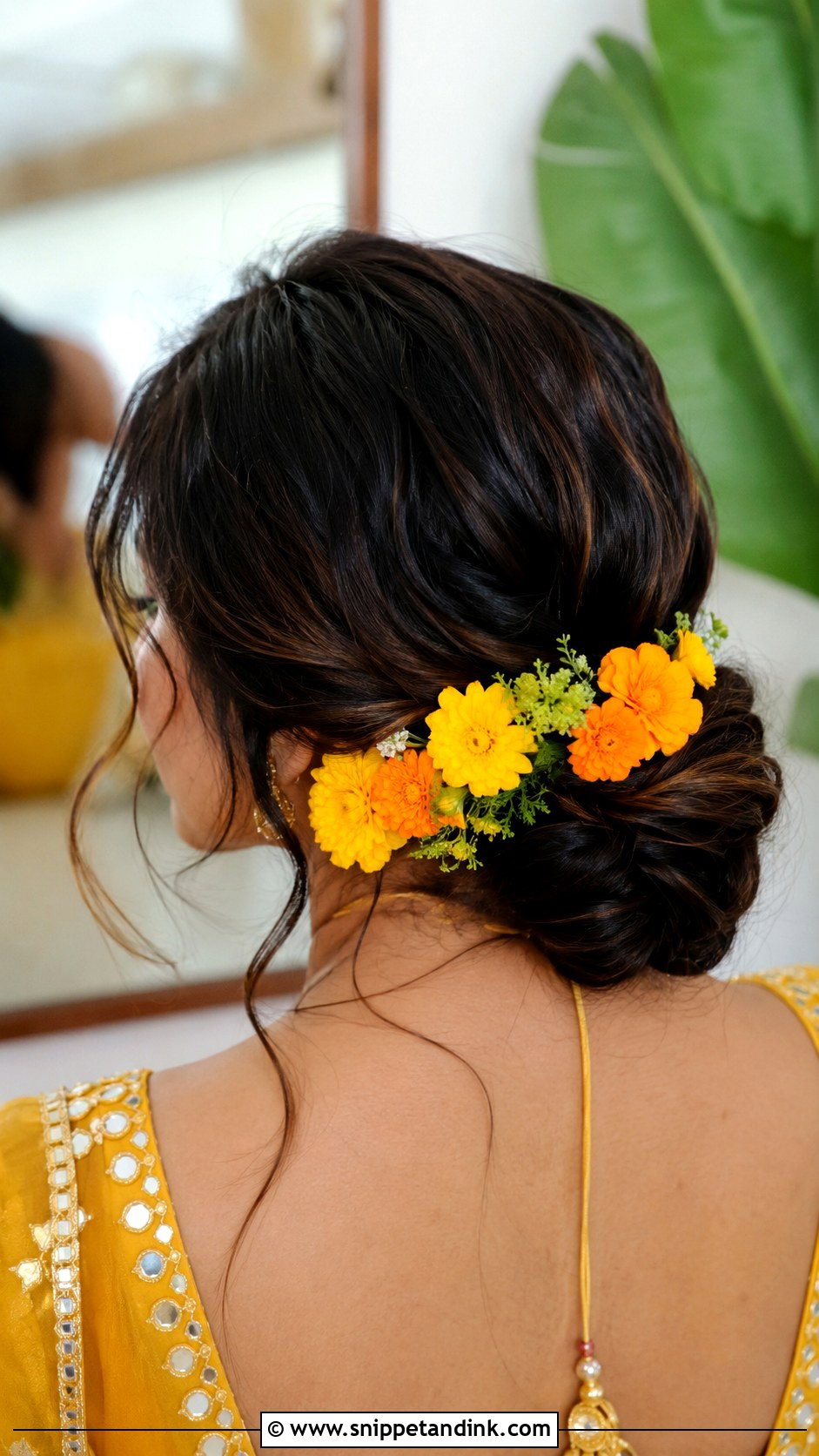 Marigold Bun for Mehendi - Snippet and Ink - 20 Ban Hairstyle Indian Wedding Ideas