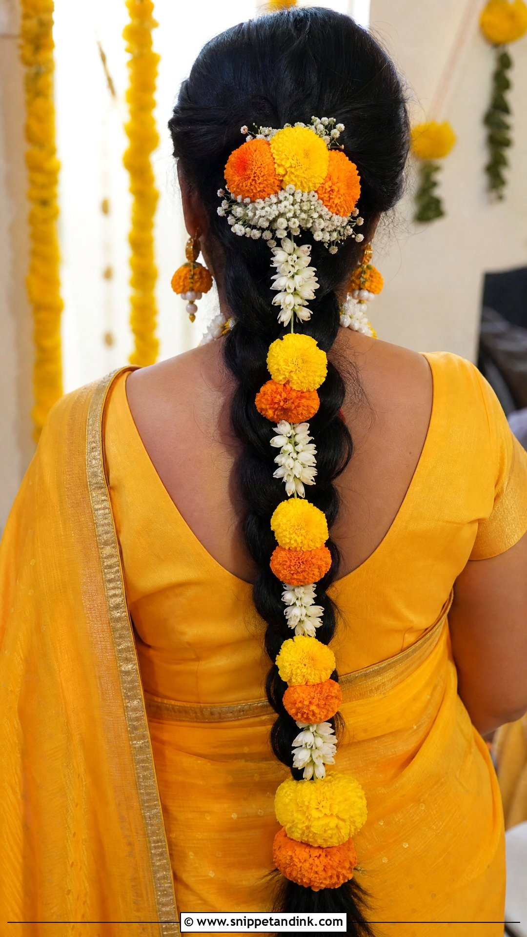 Marigold Decorated Braid - Snippet and Ink - 20 South Indian Bridal Hair Ideas