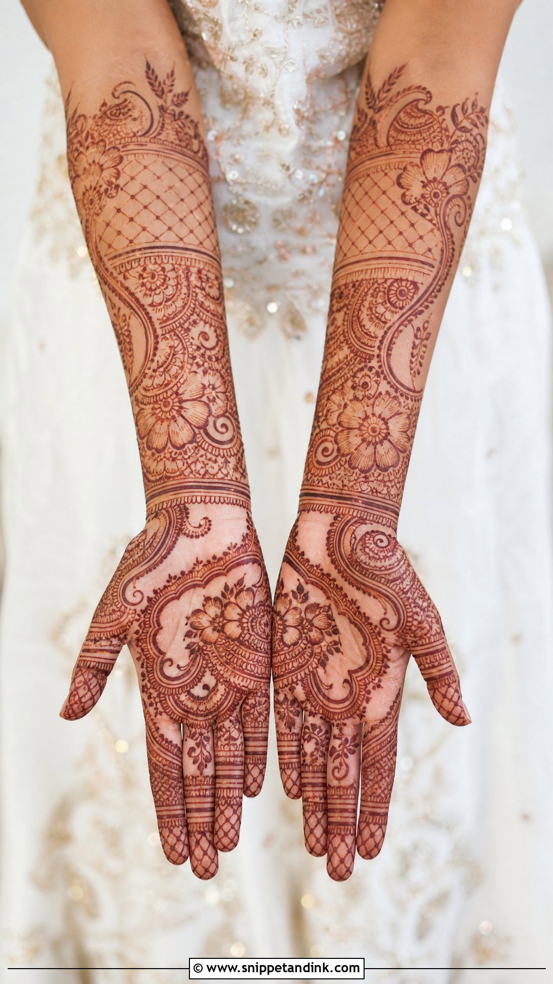 Mehendi Hairstyle For Bride With Floral Bun - Snippet and Ink - 30 Mehendi Hairstyles Brides