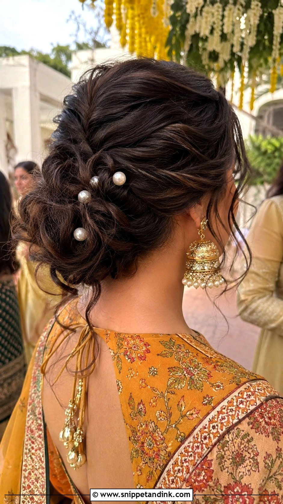 Mehndi Guest Messy Low Bun - Snippet and Ink - 20 Mehndi Guest Hairstyle Ideas