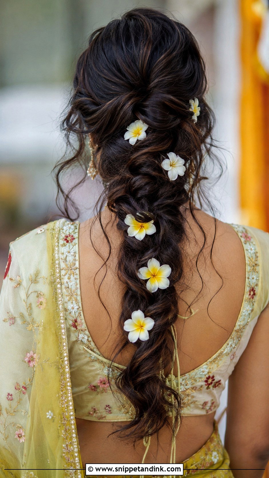 Messy Braid With Frangipani - Snippet and Ink - 30 South Indian Bridal Hairstyles