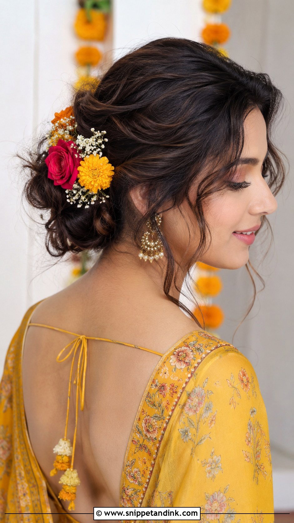 Messy Braided Bun With Flowers - Snippet and Ink - 20 Haldi Braid Hairstyles for Bride