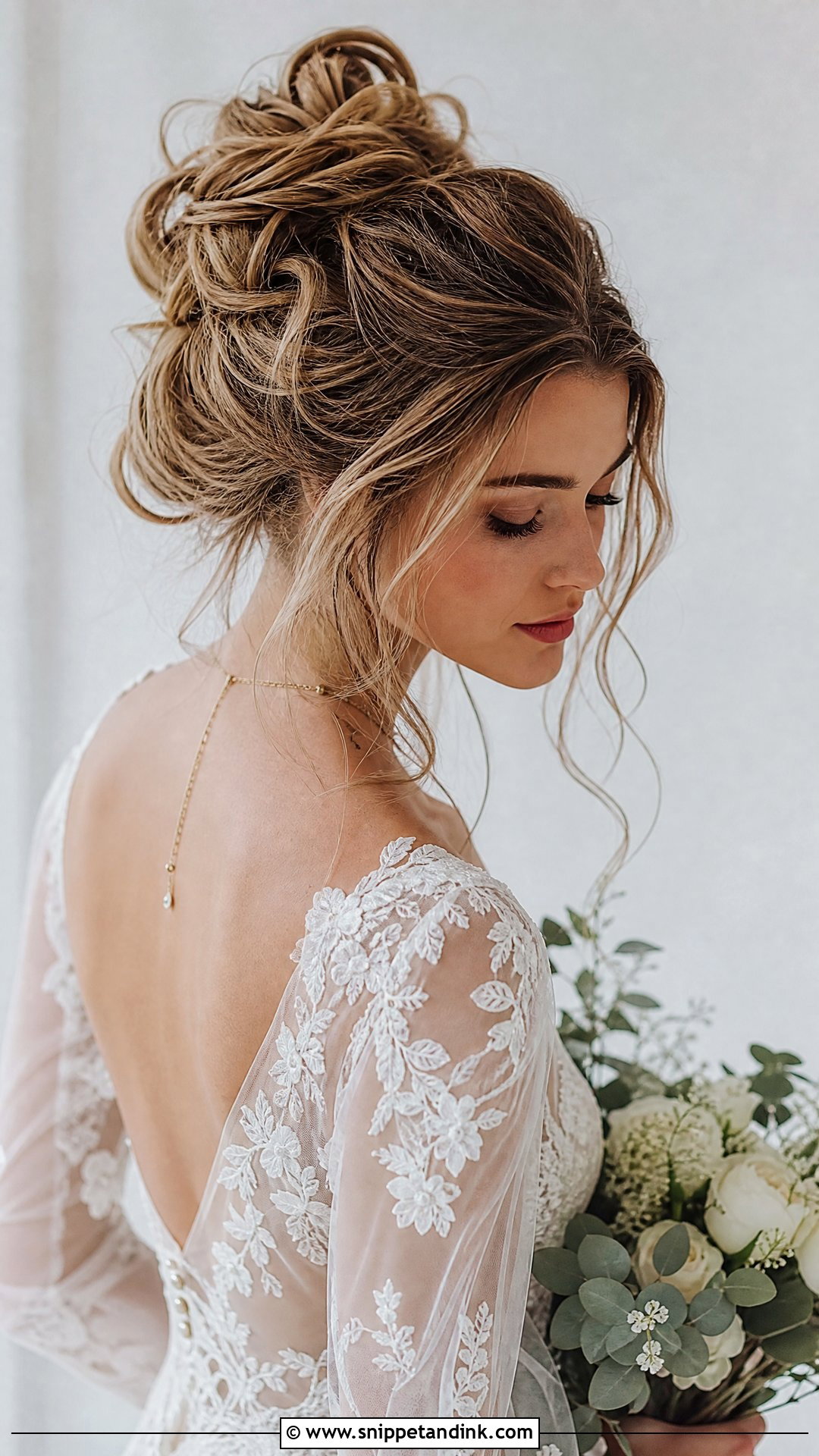 Messy Bridal Bun With Loose Strands - Snippet and Ink - 25 Bridal Bun Hairstyles Brides