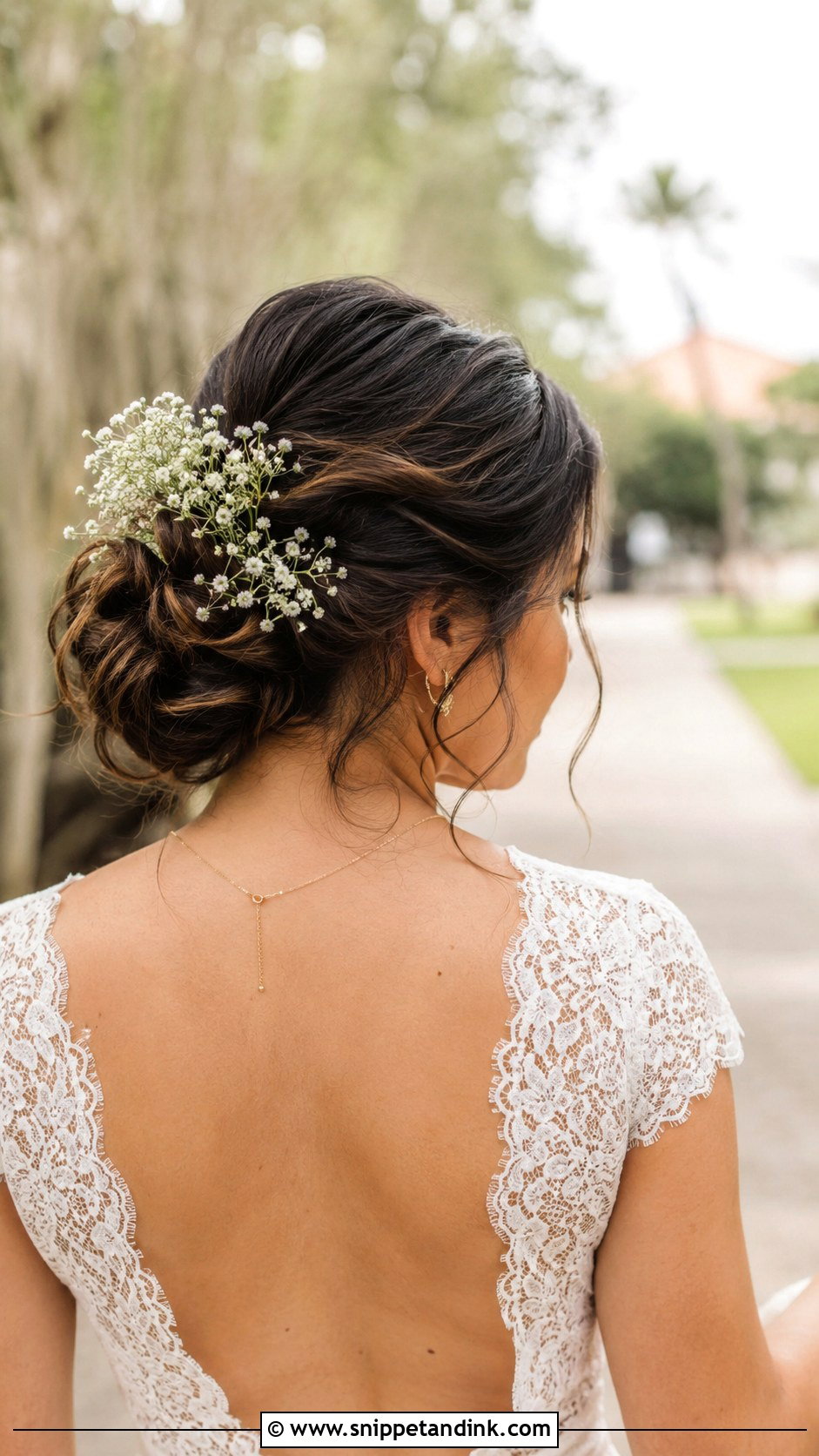 Messy Bun With Babys Breath - Snippet and Ink - 25 Messy Bride Hairstyles