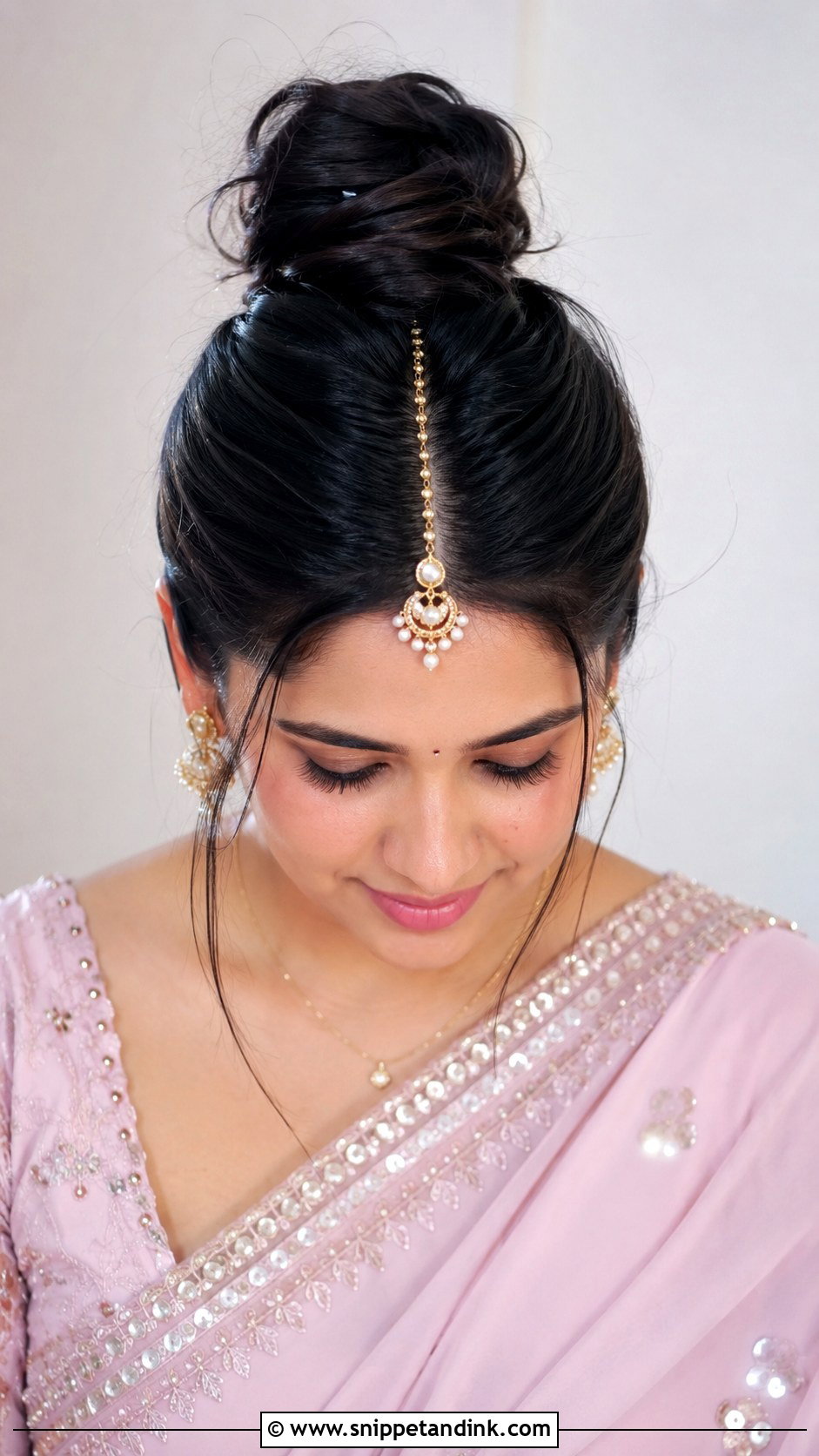 Messy Bun With Center Part - Snippet and Ink - 25 Indian Messy Bun Hairstyles for Wedding