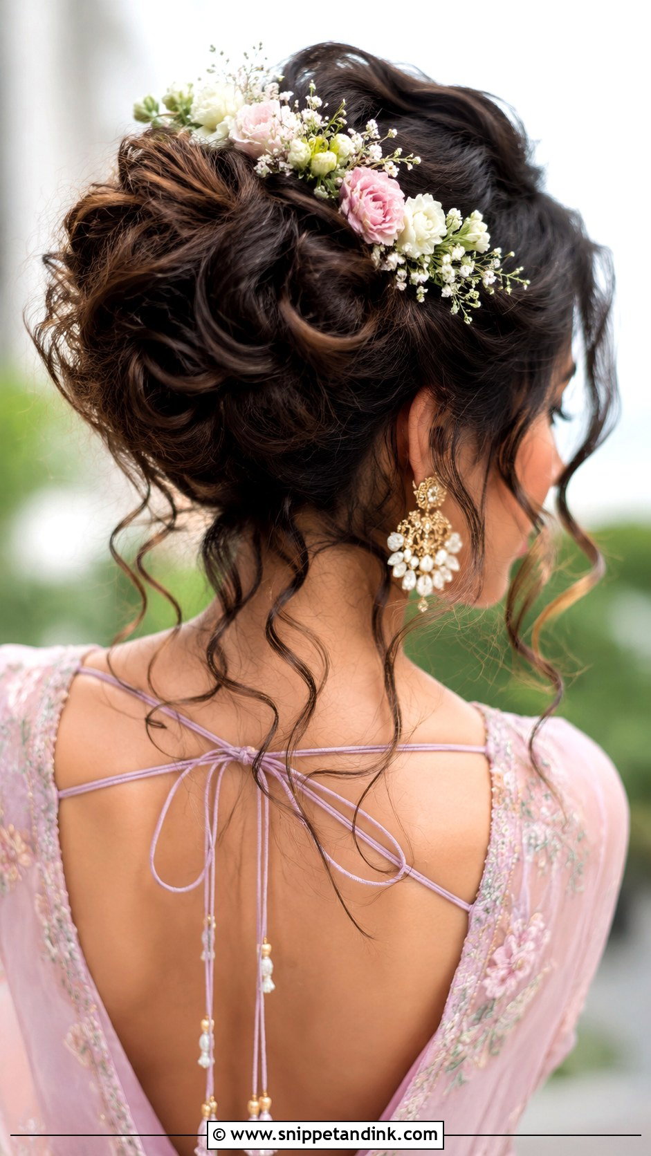 Messy Bun With Curls and Flowers - Snippet and Ink - 20 Pre Wedding Hairstyles