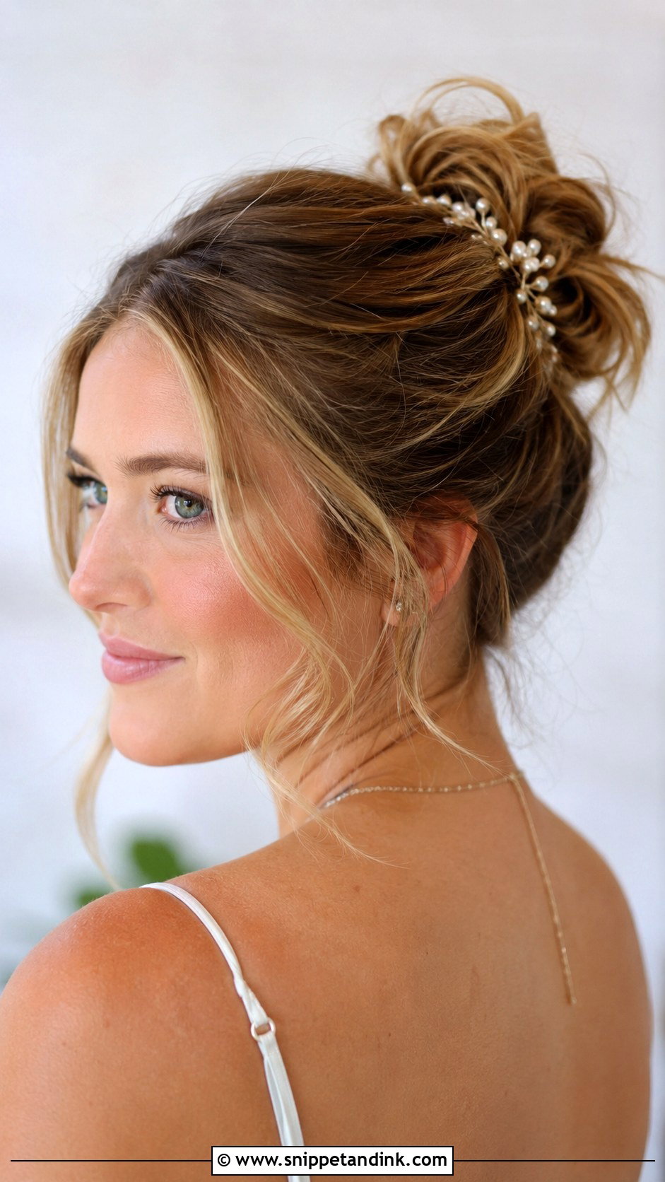 Messy Bun With Face Framing Pieces - Snippet and Ink - 30 Hair Looks for Wedding Guest