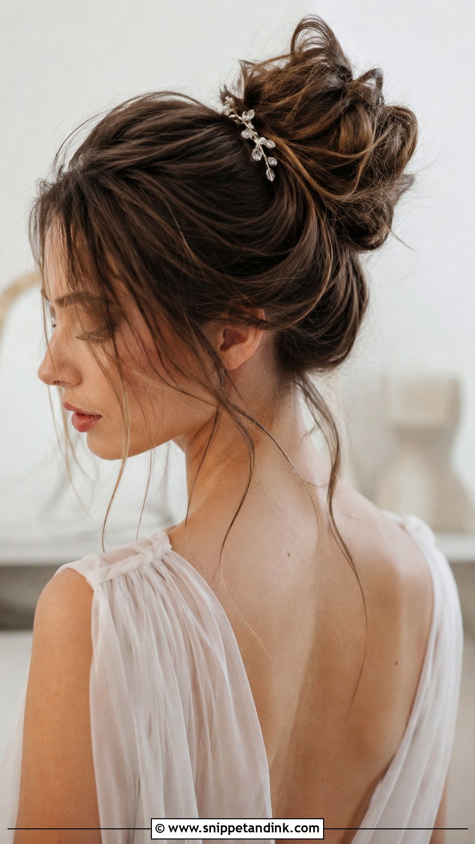 Messy Bun With Face Framing Tendrils - Snippet and Ink - 25 Whimsical Bridal Hair Ideas