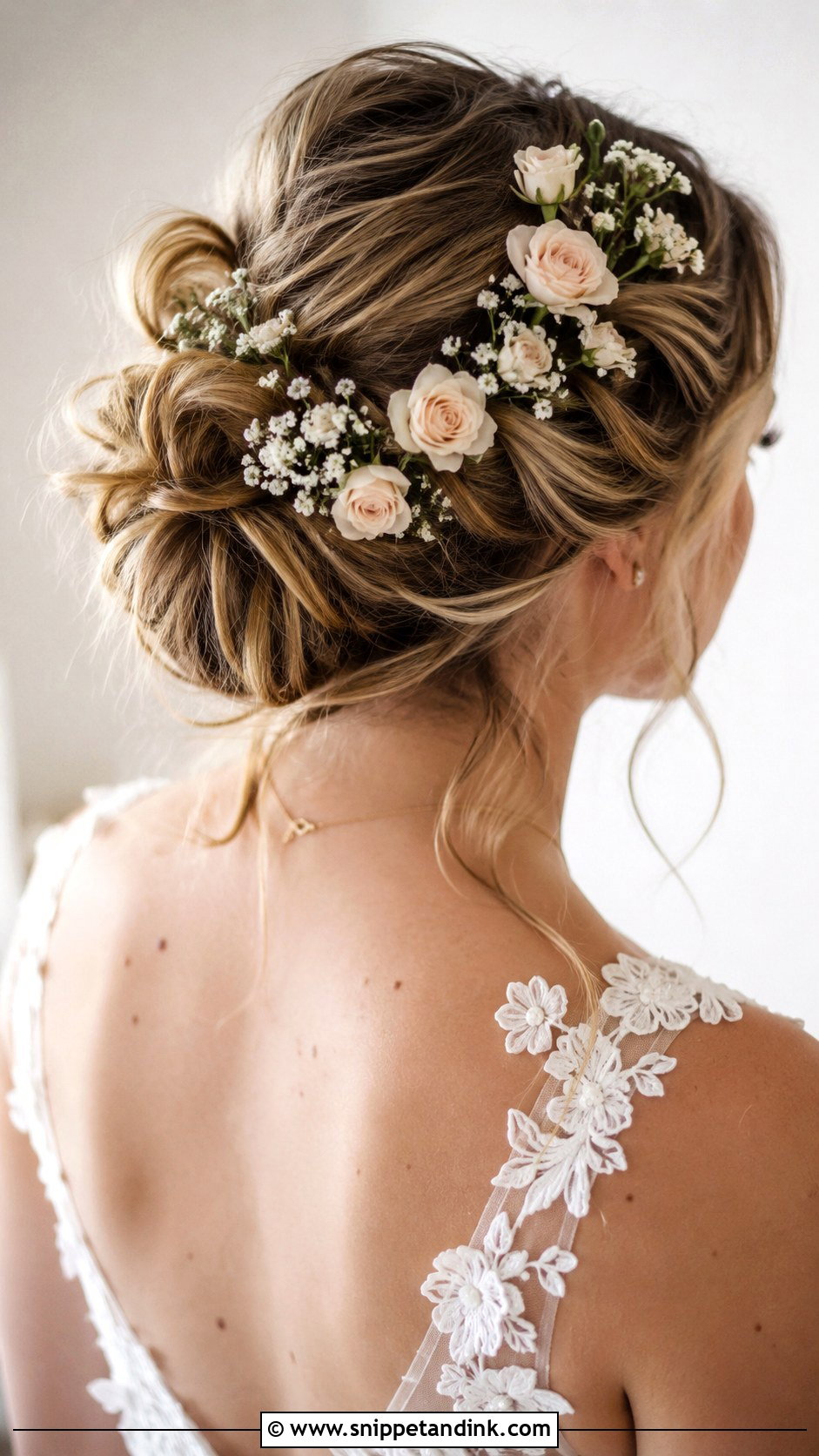 Messy Bun With Flowers - Snippet and Ink - 25 Messy Bun for Wedding Ideas