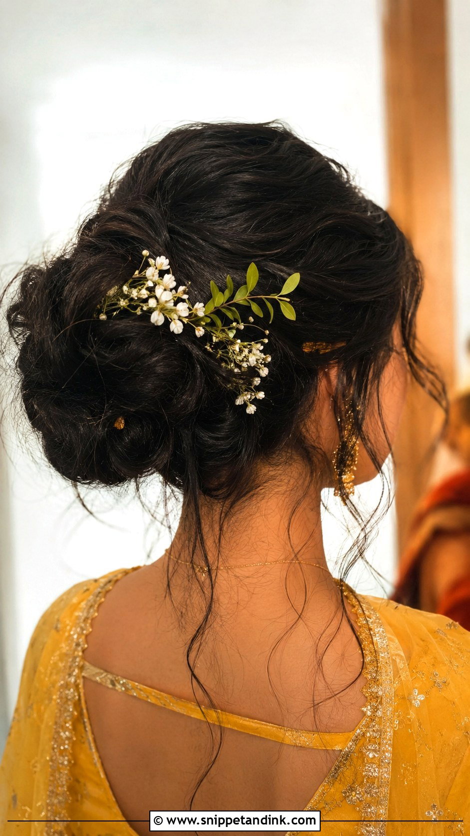 Messy Bun With Flowers and Leaves - Snippet and Ink - 20 Messy Hairstyles for Indian Wedding