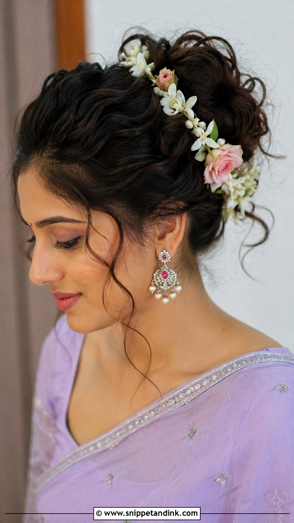 Messy Bun With Loose Curls And Flowers - Snippet and Ink - 20 Valaikappu Hairstyles