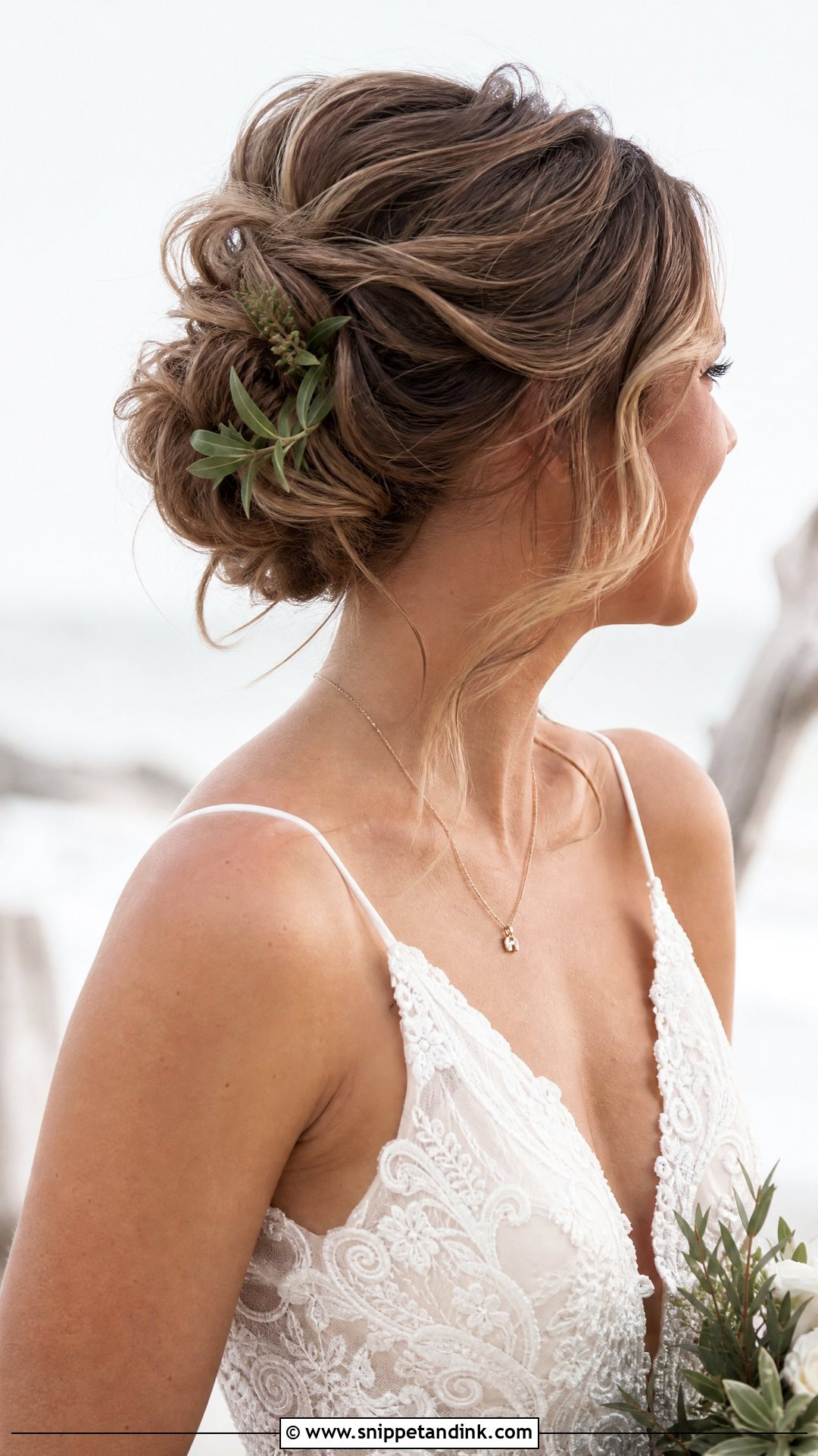 Messy Bun With Loose Strands - Snippet and Ink - 20 Wedding Hair Inspo Ideas