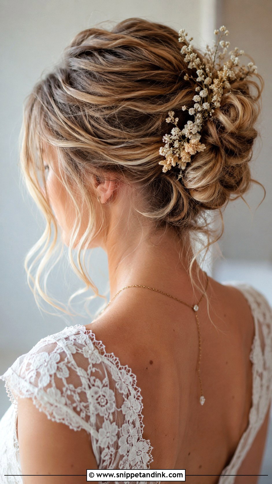 Messy Bun With Loose Tendrils - Snippet and Ink - 20 Fall Wedding Hair Ideas