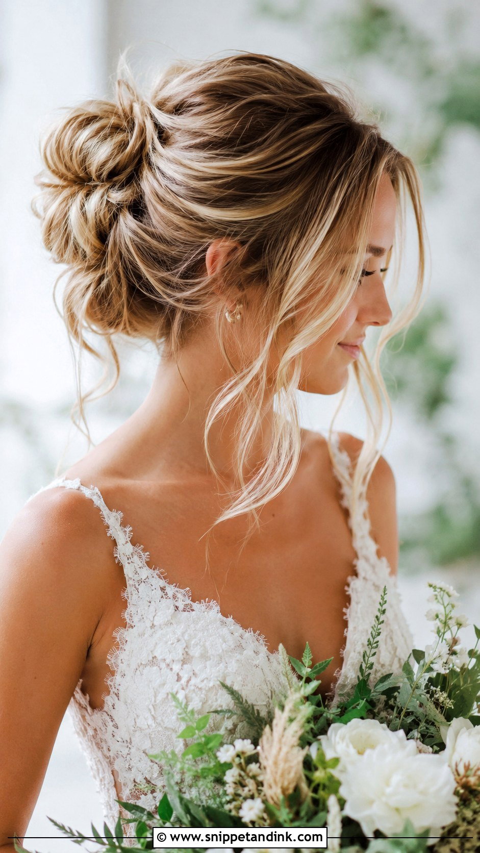 Messy Bun With Loose Tendrils - Snippet and Ink - 20 Round Face Wedding Hairstyles