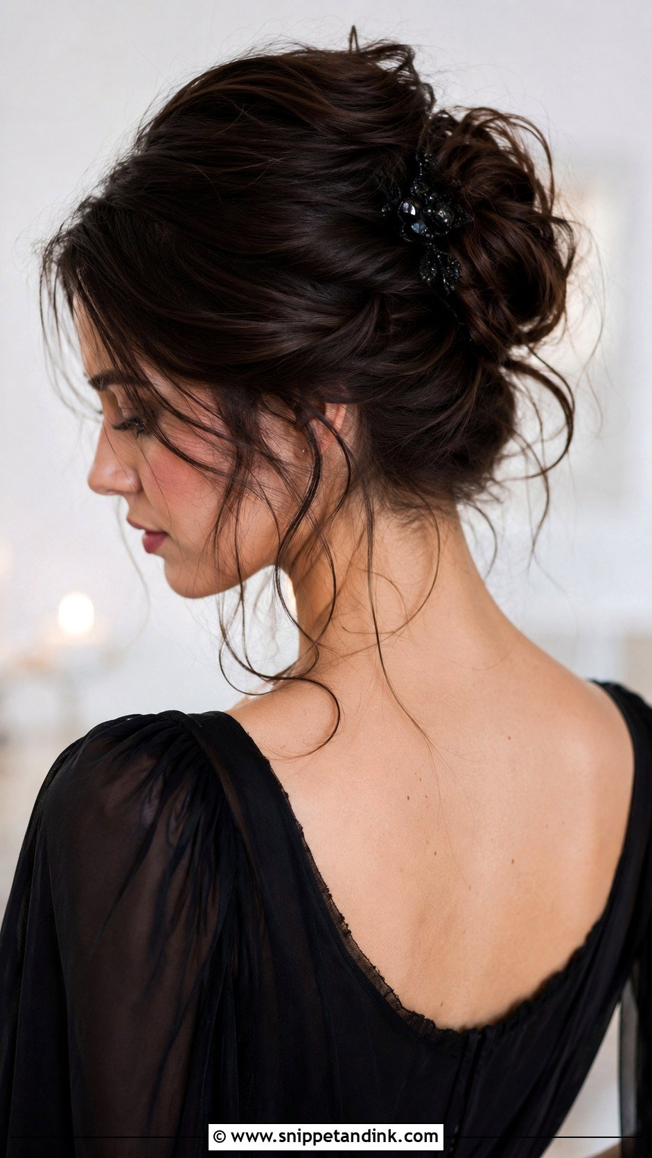 Messy Bun With Loose Tendrils - Snippet and Ink - 25 Goth Wedding Hair Ideas