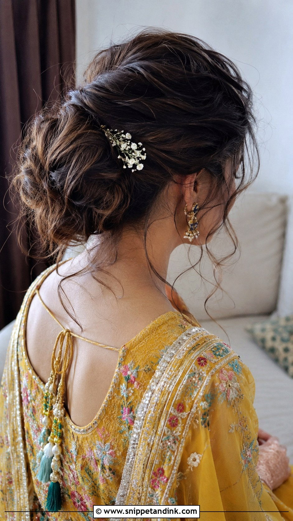 Messy Bun With Loose Tendrils - Snippet and Ink - 25 Mehndi Hairstyles for Bride Sister