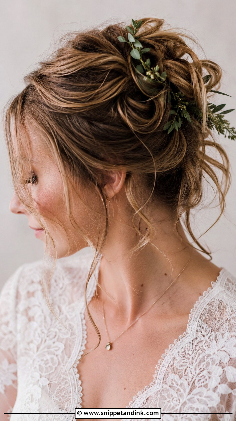 Messy Bun With Loose Tendrils - Snippet and Ink - 25 Shoulder Length Wedding Hairstyles