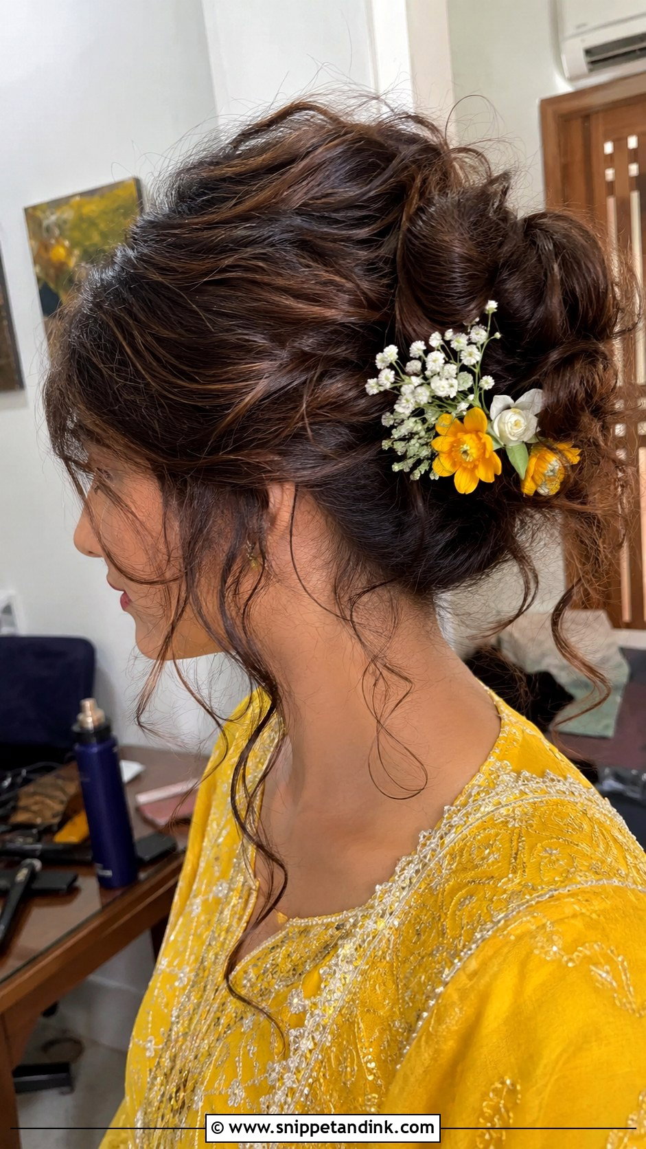 Messy Bun With Loose Tendrils - Snippet and Ink - 20 Hindu Bridal Hairstyles