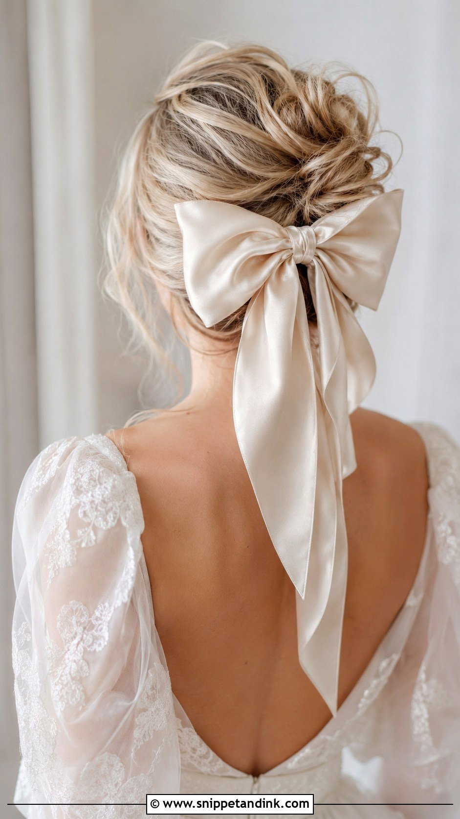 Messy Bun With Oversized Satin Bow - Snippet and Ink - 25 Wedding Hair Bow Ideas