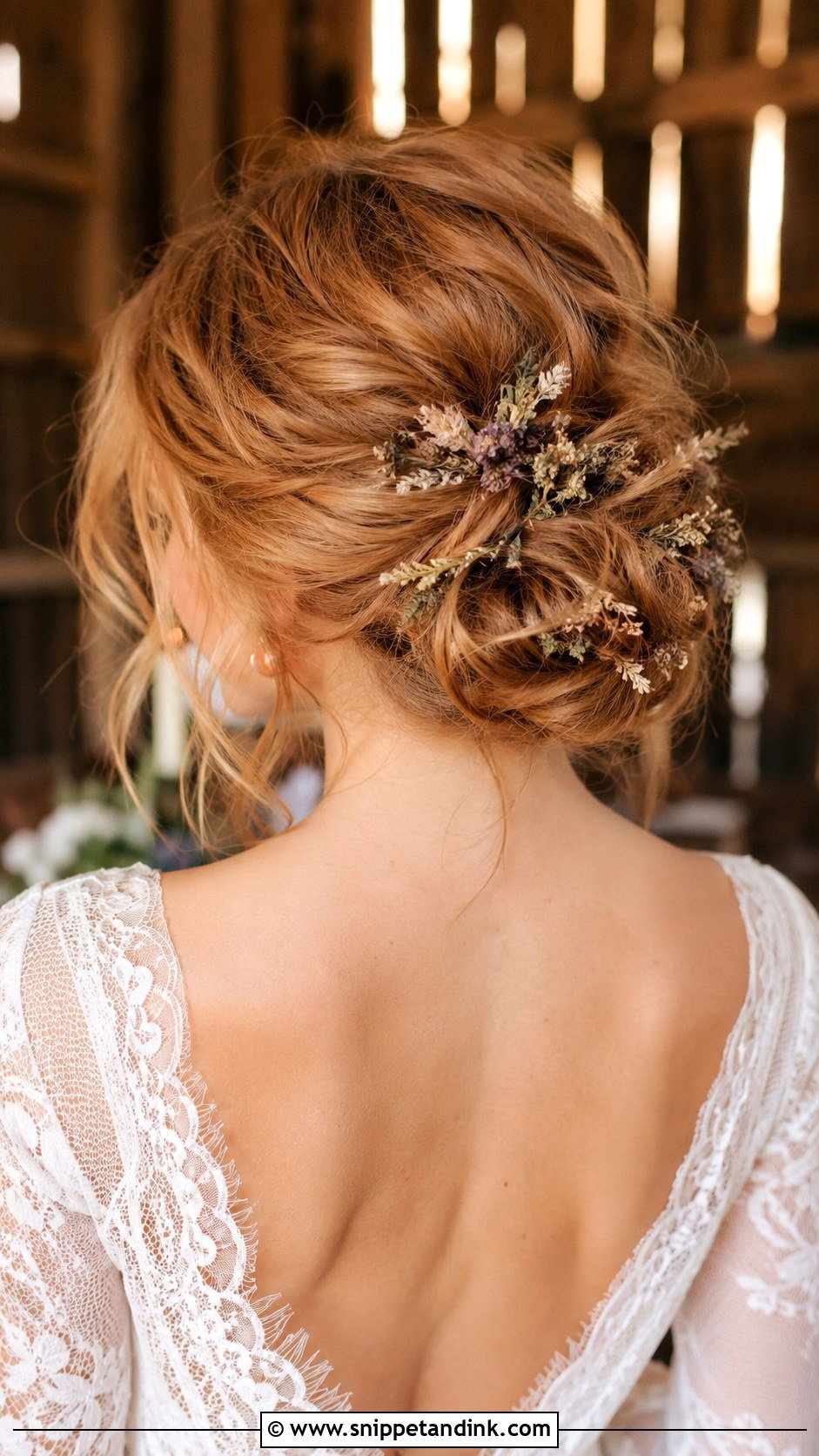 Messy Bun With Wildflowers - Snippet and Ink - 25 Wedding Hair Flowers