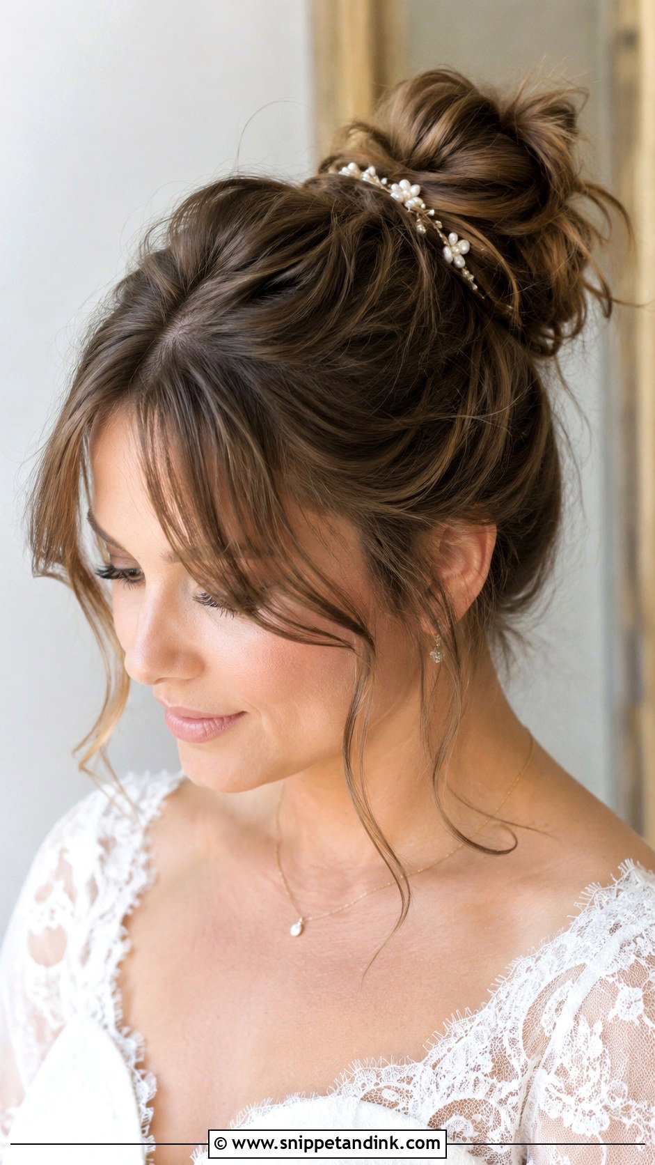 Messy Bun With Wispy Bangs - Snippet and Ink - 25 Bridal Hairstyles for Round Face