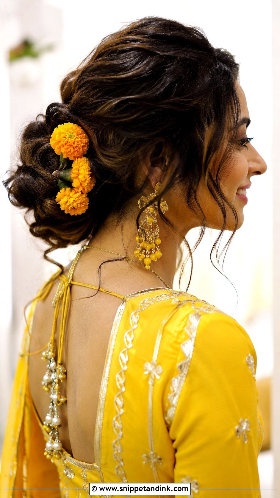 Messy Bun for Mehndi Function - Snippet and Ink - 20 Hairstyle for Indian Bride Ideas