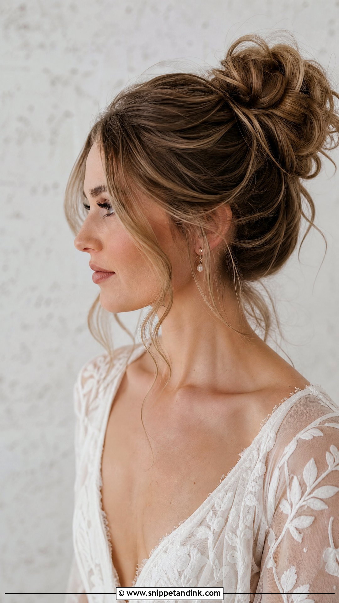 Messy Bun with Face Framing Pieces - Snippet and Ink - 20 Wedding Hair Ideas for Long Hair
