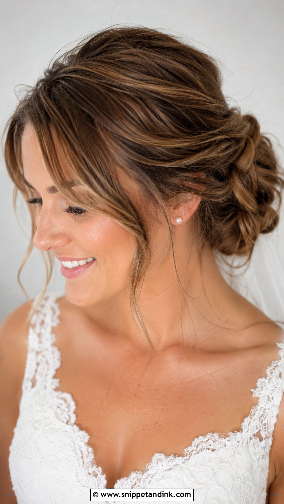 Messy Chignon With Side Bangs - Snippet and Ink - 15 Wedding Hairstyles for Bangs