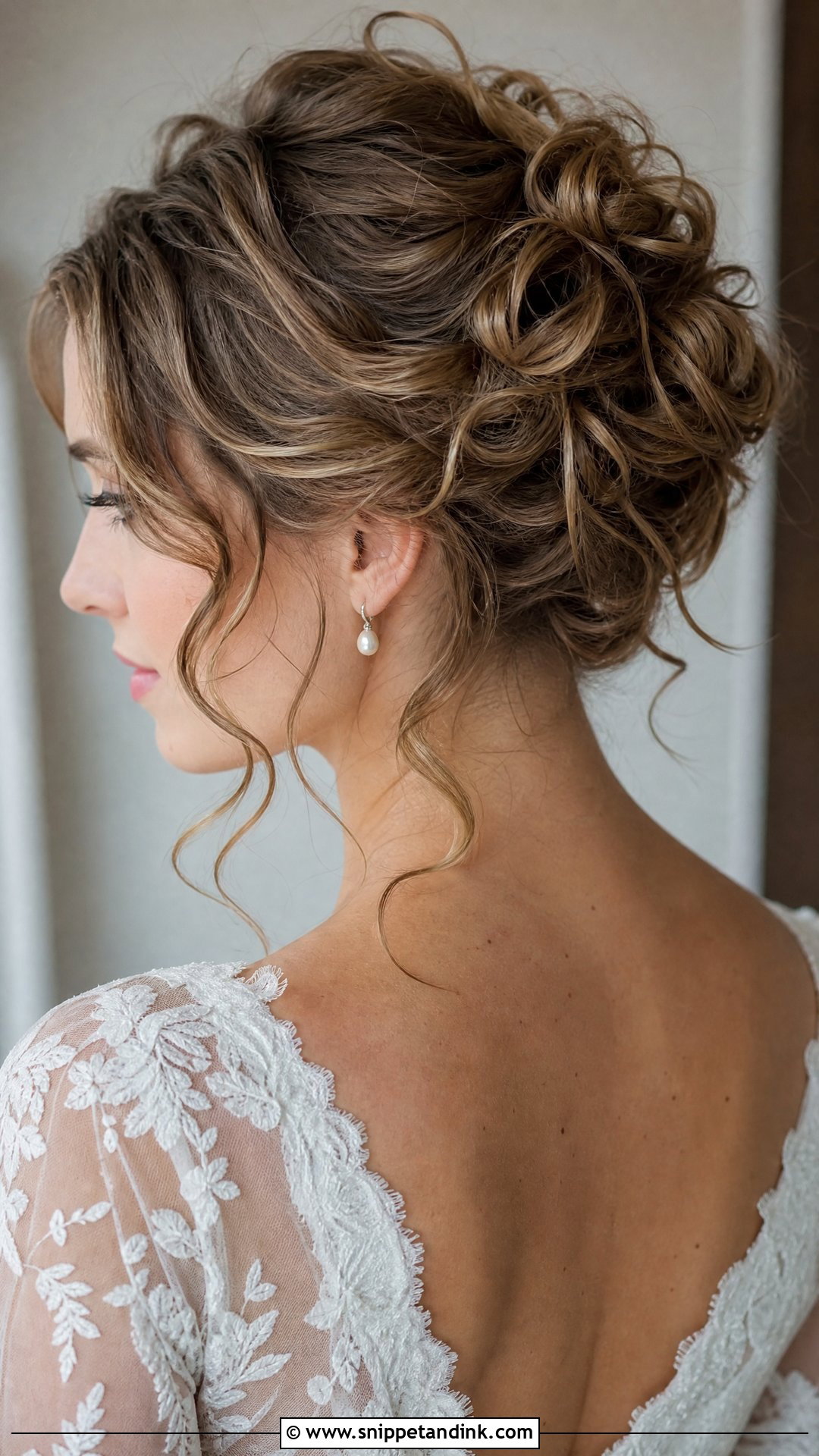 Messy Curly Bridal Bun - Snippet and Ink - 15 Curly Bridal Bun Ideas