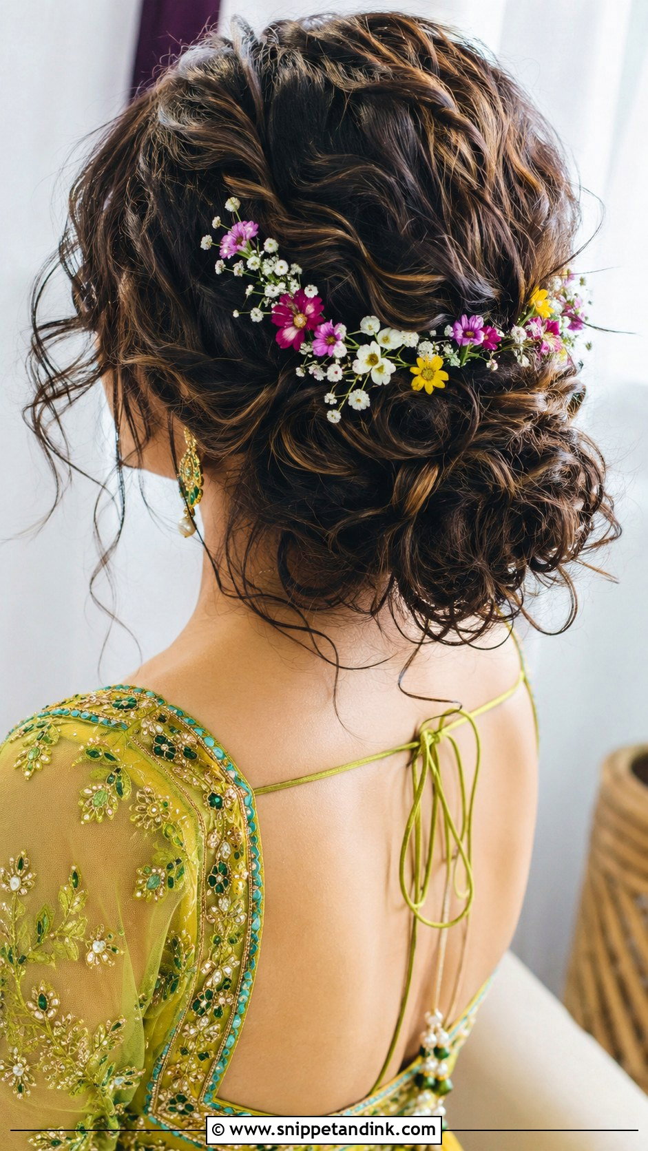 Messy Curly Bun With Loose Strands - Snippet and Ink - 25 Hindu Bride Hairstyle Ideas