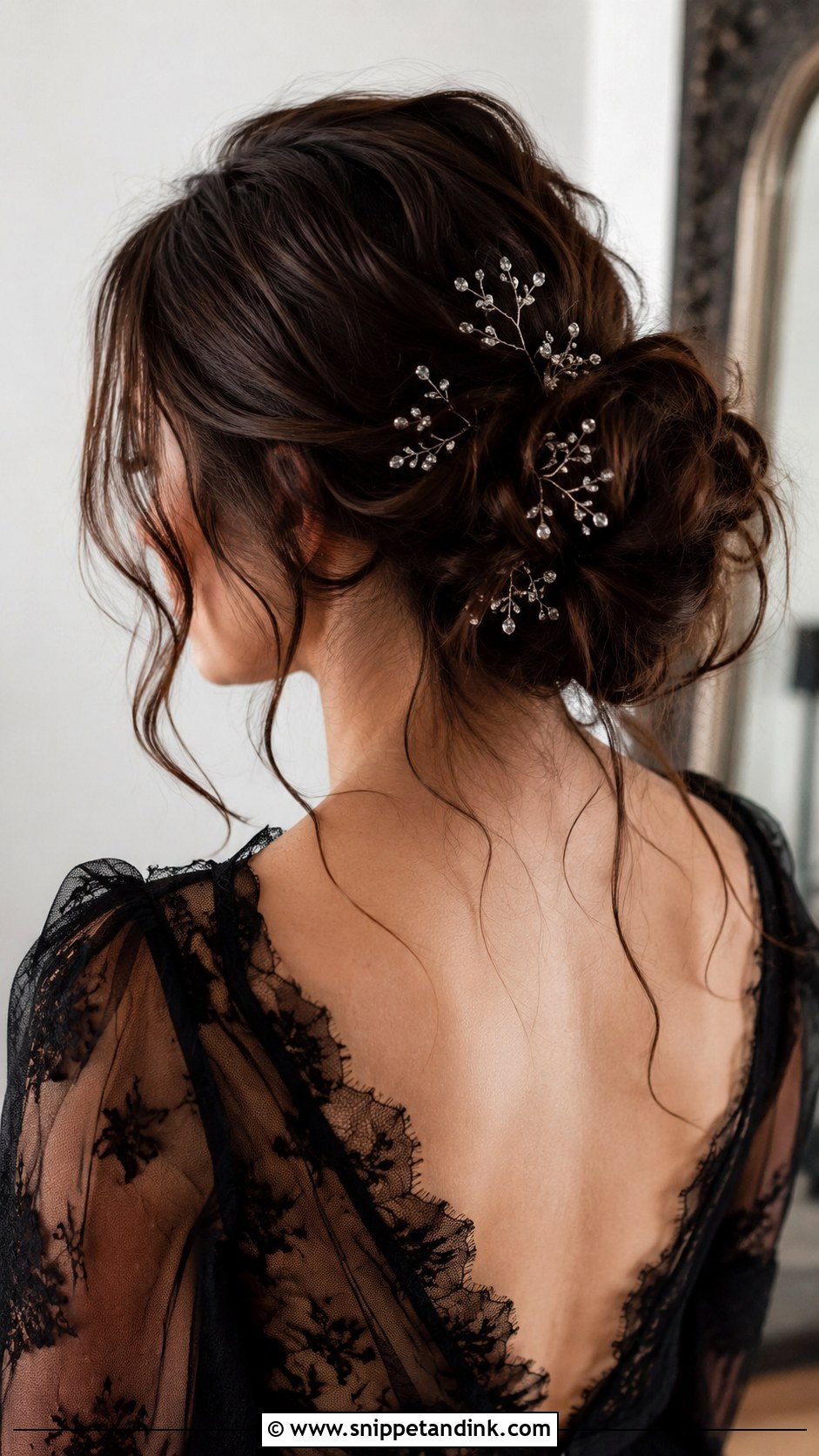 Messy Gothic Bun With Loose Strands - Snippet and Ink - 20 Gothic Wedding Hair Ideas