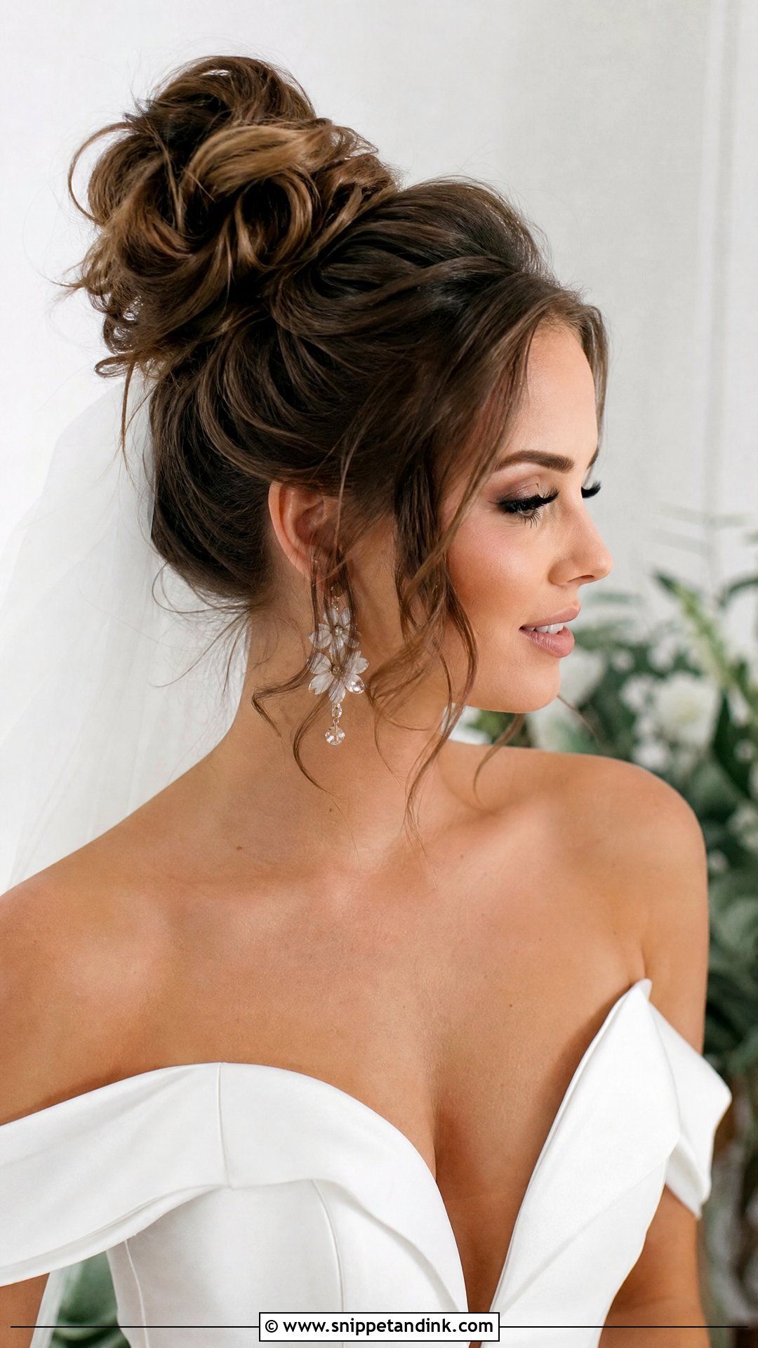 Messy High Bun - Snippet and Ink - 20 Wedding Hairstyles Front View