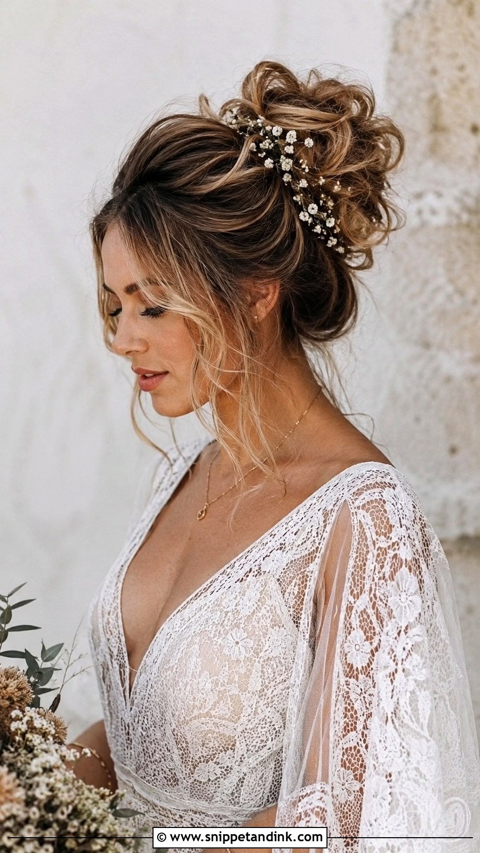 Messy High Bun With Loose Tendrils - Snippet and Ink - 25 High Bun Wedding Ideas