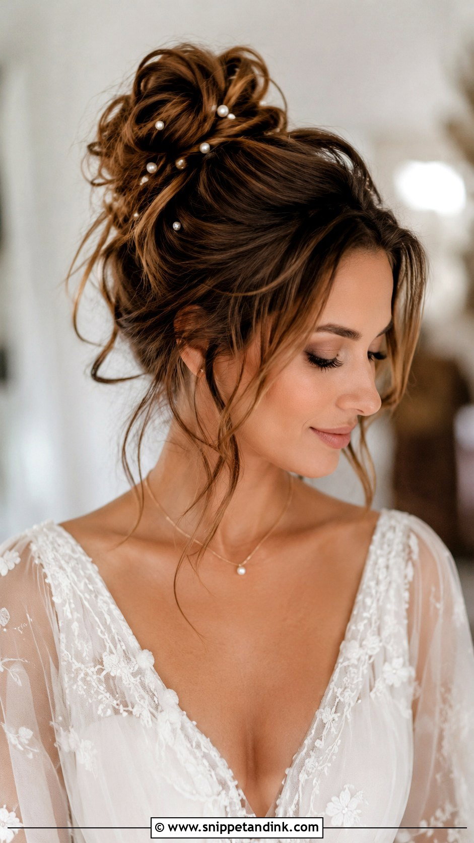 Messy High Bun With Tendrils - Snippet and Ink - 30 Hairstyles for Engagement Bride
