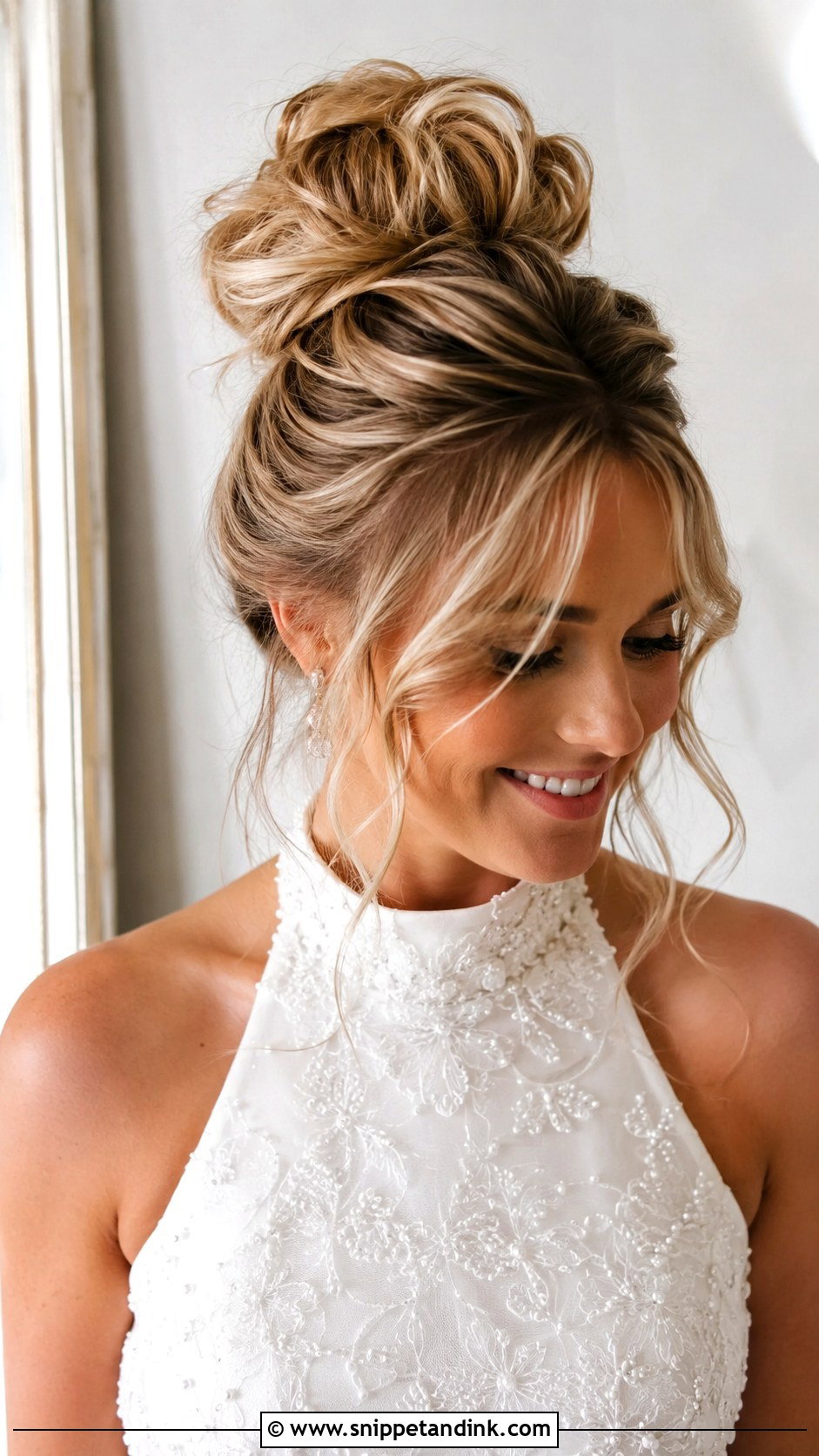 Messy High Bun With Wispy Fringe - Snippet and Ink - 25 Wedding Hair Updo Front View Ideas
