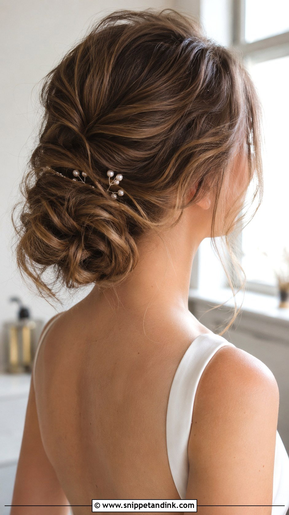 Messy Low Bun - Snippet and Ink - 25 Medium Length Wedding Hairstyles