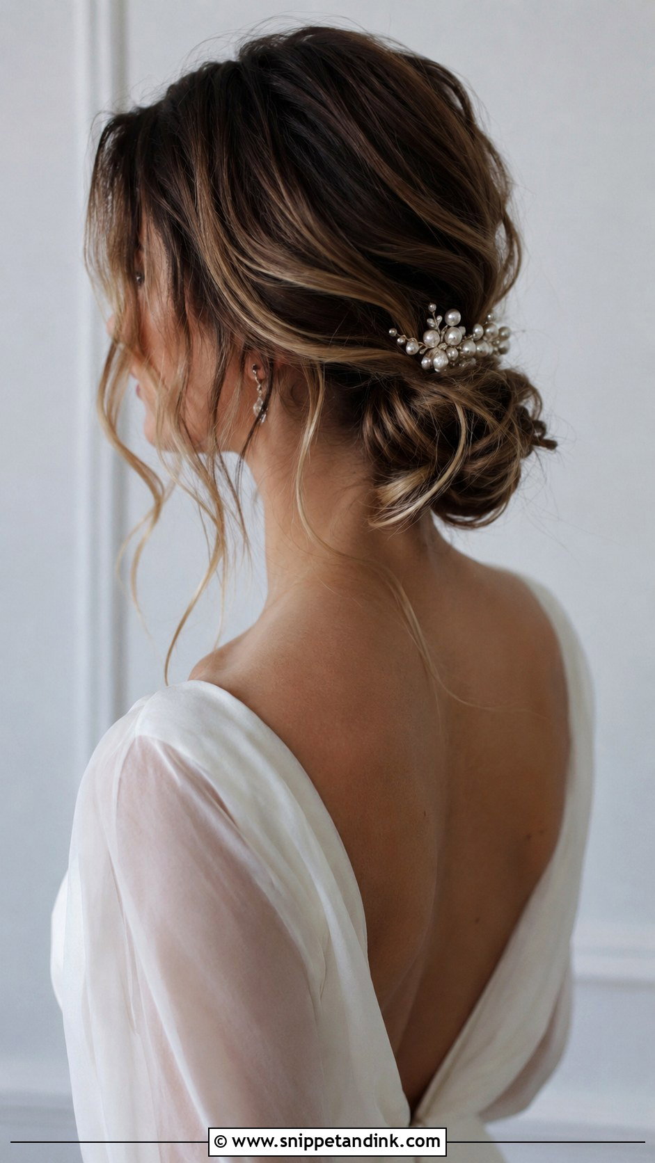 Messy Low Bun With Face Framing Pieces - Snippet and Ink - 25 Edgy Wedding Hairstyles