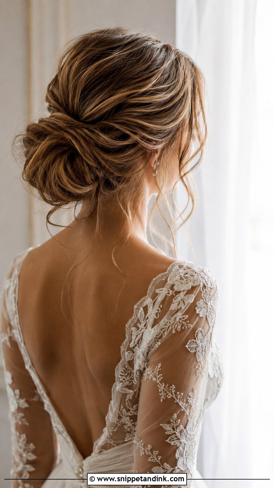 Messy Low Bun With Loose Strands - Snippet and Ink - 25 Wedding Bun Hairstyle Ideas