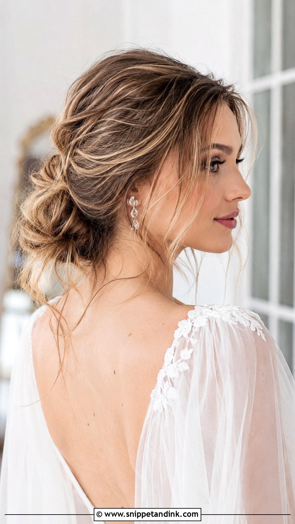 Messy Low Bun With Loose Tendrils - Snippet and Ink - 20 Low Wedding Updo Ideas