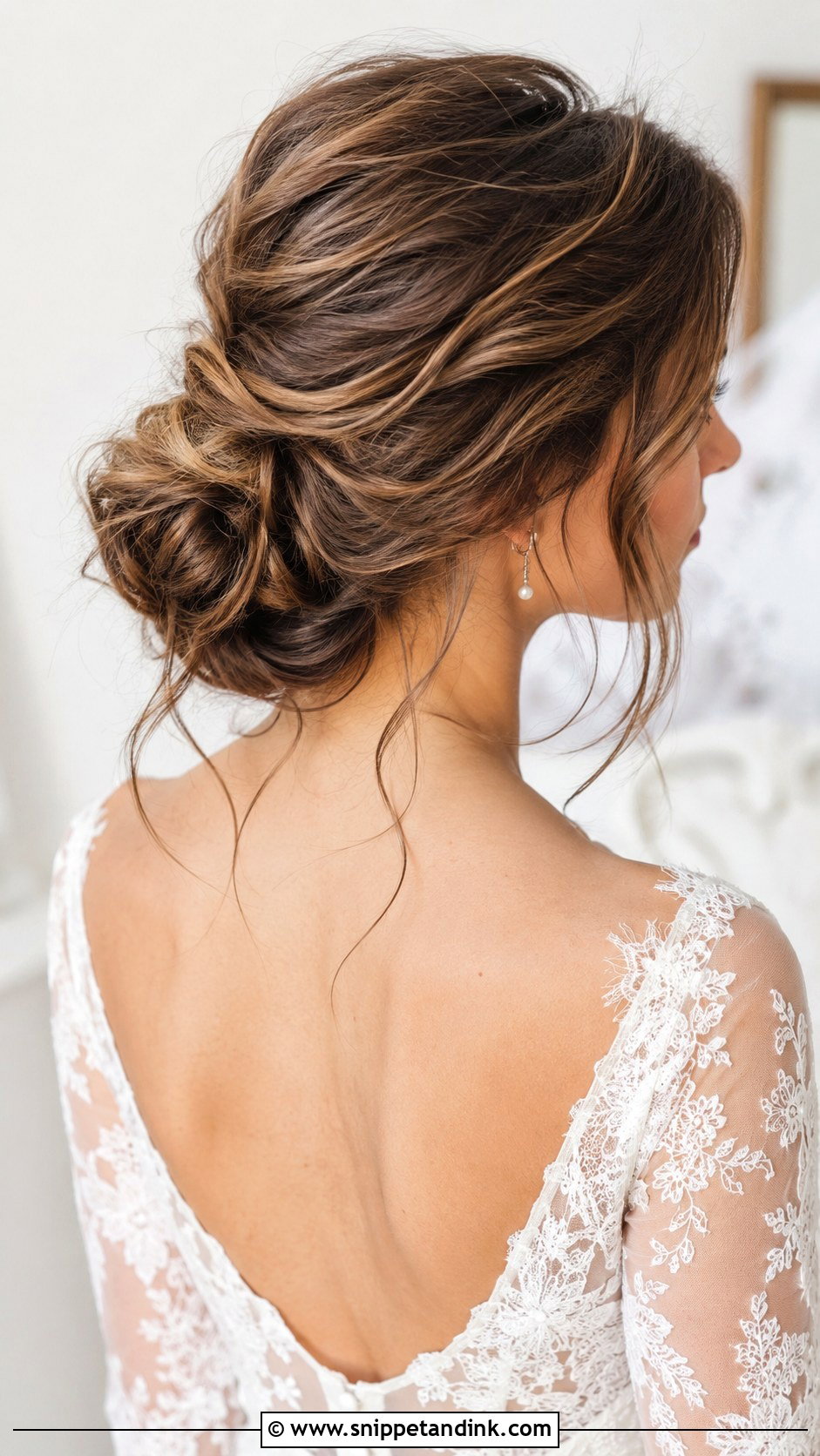 Messy Low Bun With Loose Tendrils - Snippet and Ink - 20 Textured Wedding Updo Ideas