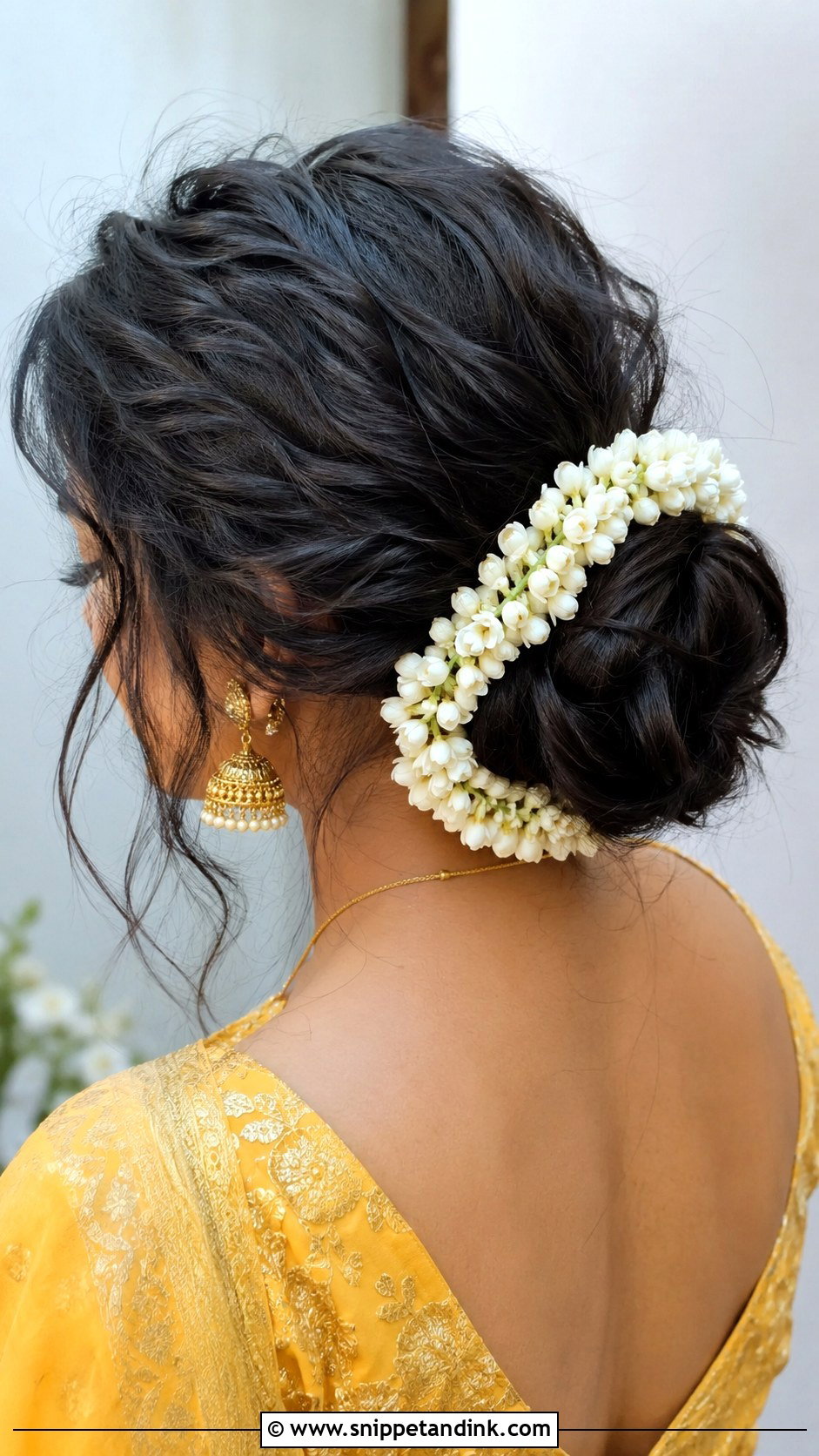 Messy Updo Bun With Gajra - Snippet and Ink - 25 Indian Wedding Hairstyle for Short Hair Ideas