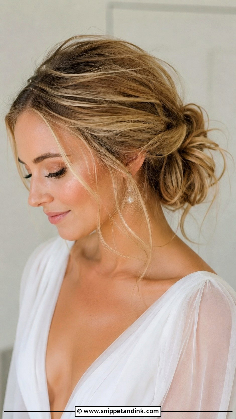 Messy Wedding Bun With Face Framing - Snippet and Ink - 15 Wedding Bun Front View Ideas